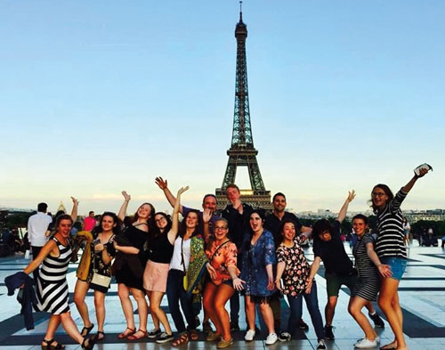 A group that used educational travel services to go to Paris